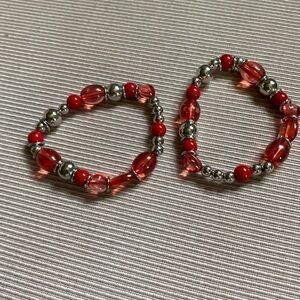 Two piece silver and red beaded bracelets